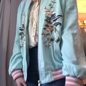 Pastel blue, pink, and white bomber jacket